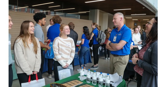 Robert Dyer, CEO of Cozad Community Health System, meets with health science students Tuesday during the Hospital Partners Networking Event at UNK. (Photo by Erika Pritchard, UNK Communications)