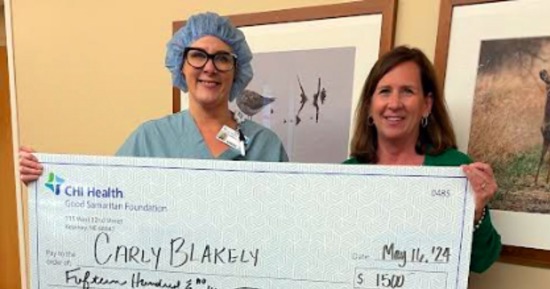 Carly Blakely, RN (left) was recently awarded a $1,500 Health Care Career Scholarship from CHI Health Good Samaritan’s Foundation Director Cindi Richter (right). Blakely, a registered nurse in the hospital’s operating room, was one of 26 recipients of the annual scholarship program made possible by generous donors.