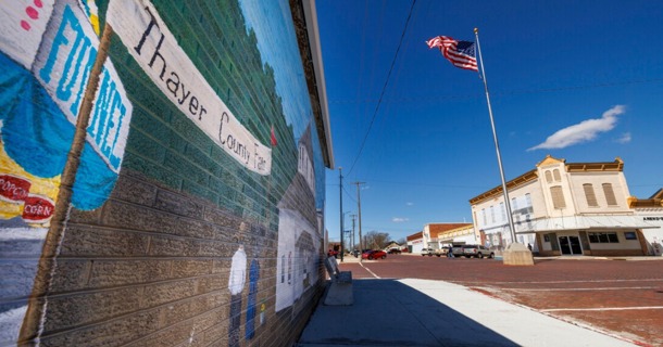 : A mural is seen on a building in downtown Deshler, Nebraska, in April 2024. The new All Things Nebraska website includes nearly 30 years of data from the Nebraska Rural Poll. (Craig Chandler/University Communication and Marketing)